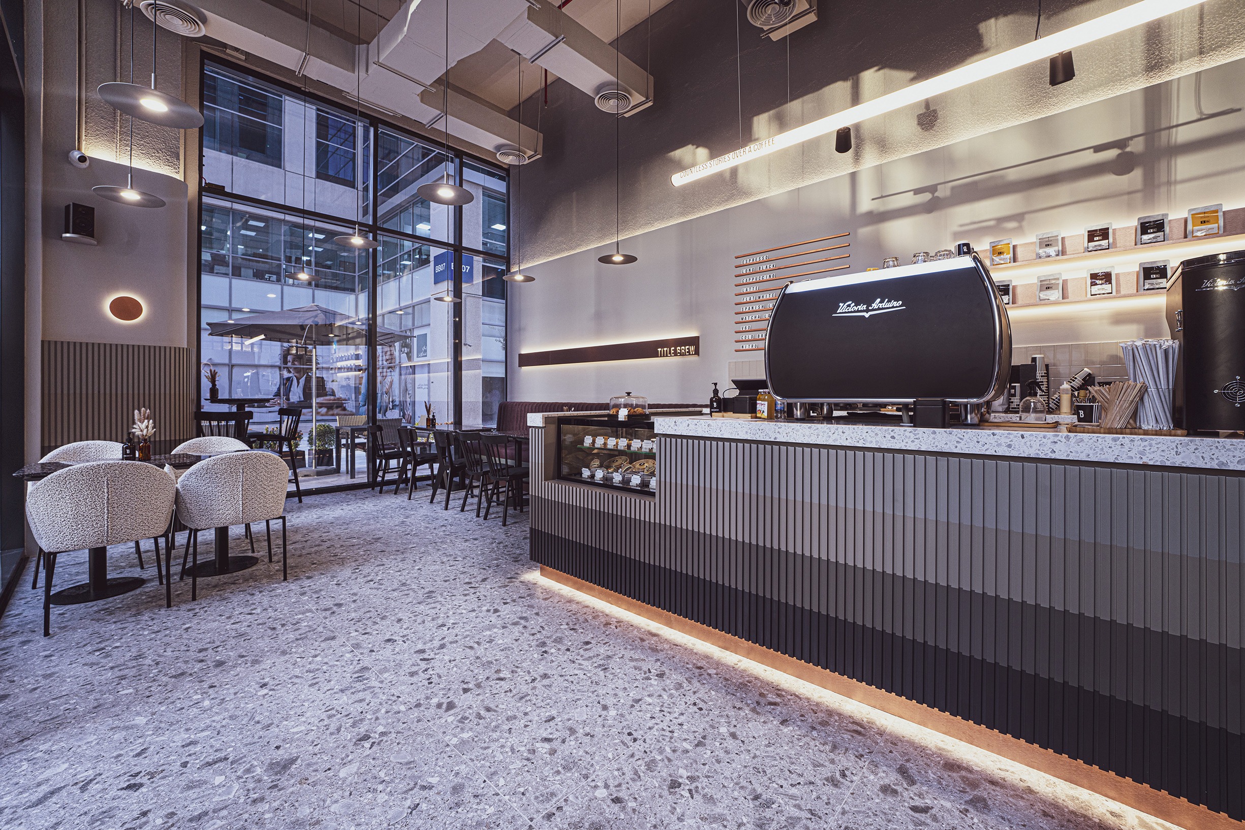 Interior design of stitle brew specialty coffee bay square by kg design photo 15