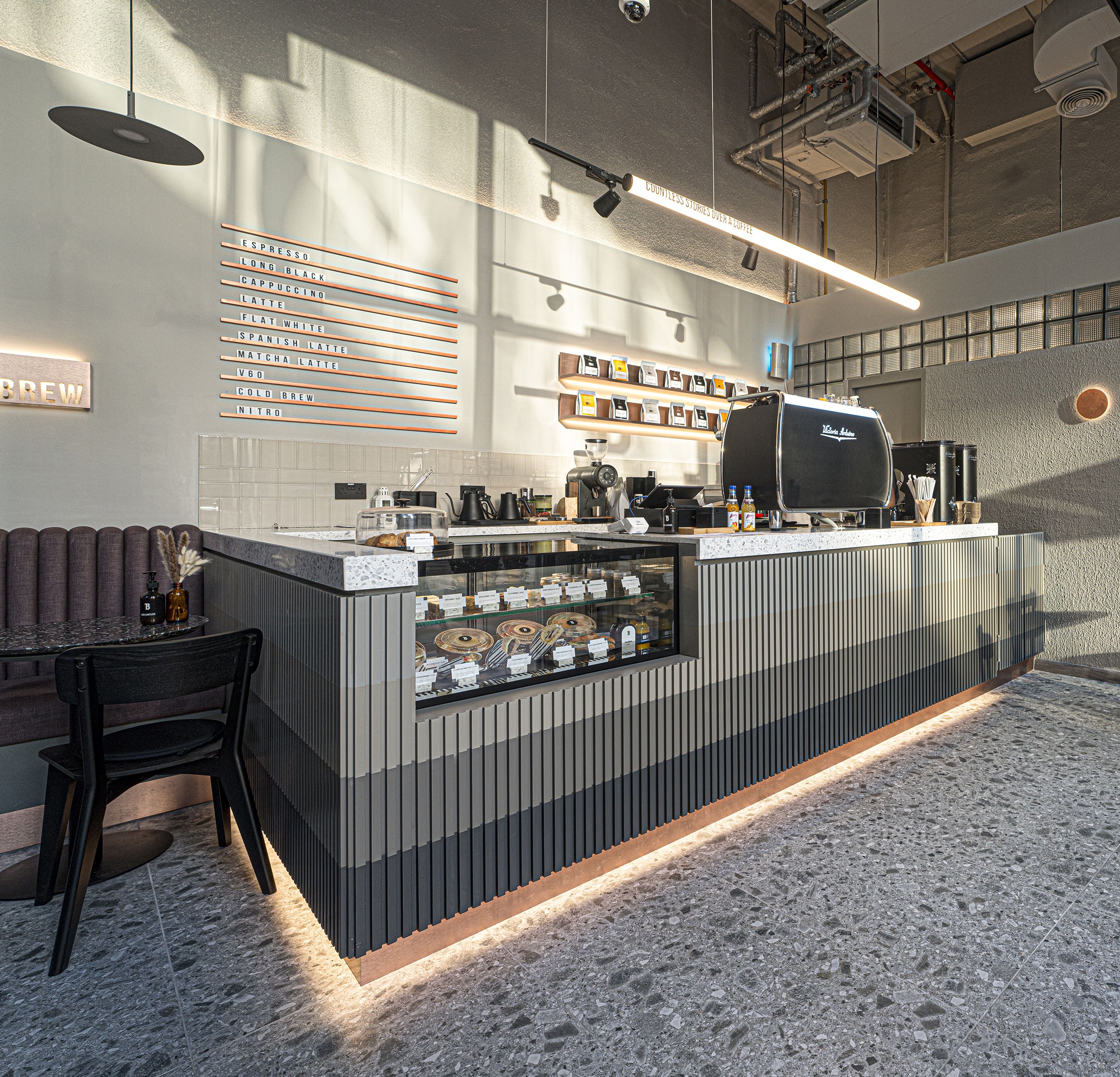 Interior design of stitle brew specialty coffee bay square by kg design photo 21