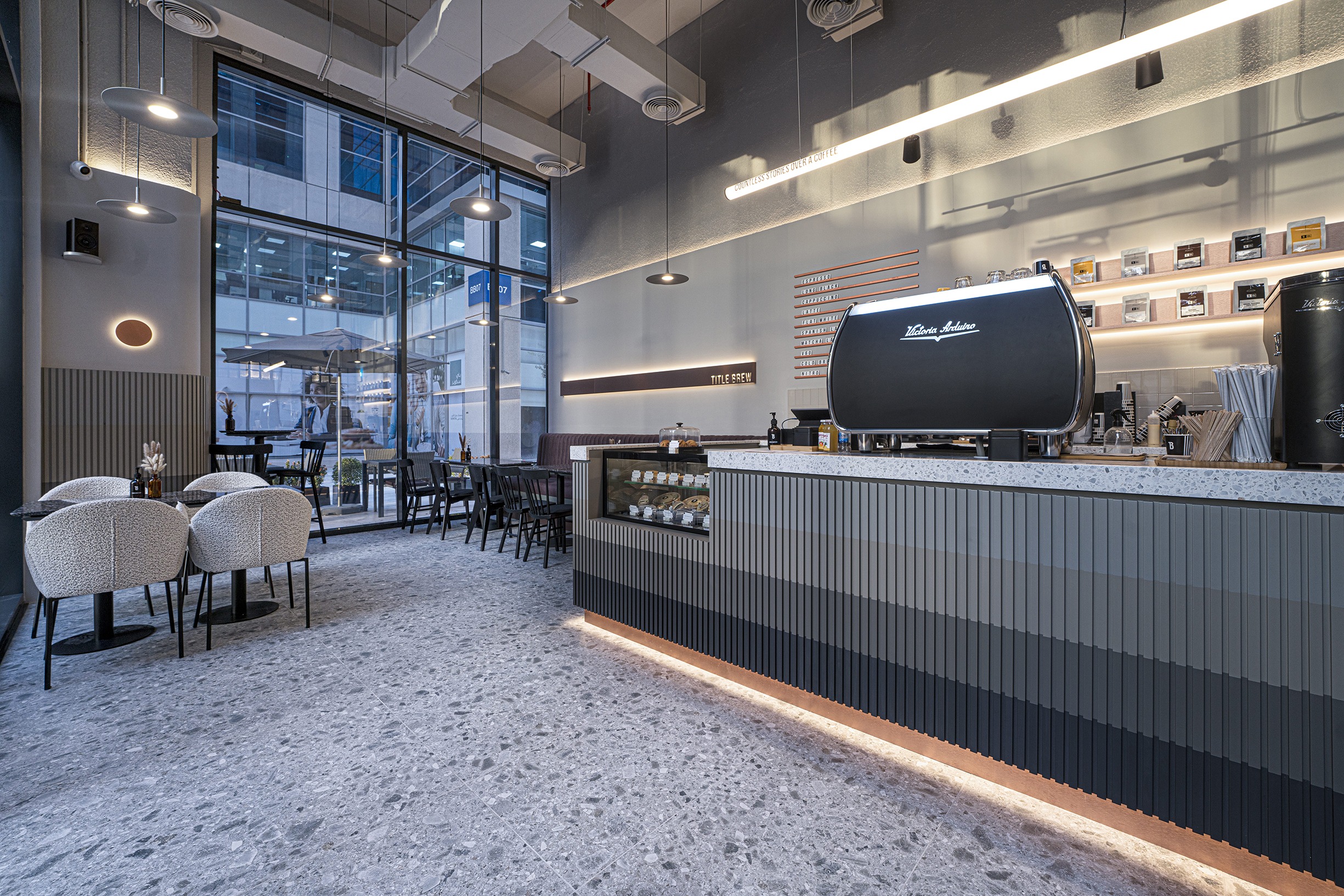 Interior design of stitle brew specialty coffee bay square by kg design photo 28