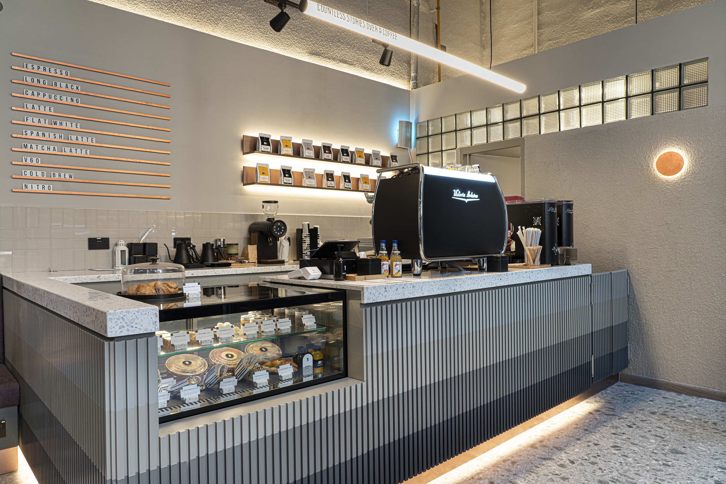 Interior design of stitle brew specialty coffee bay square by kg design photo 30